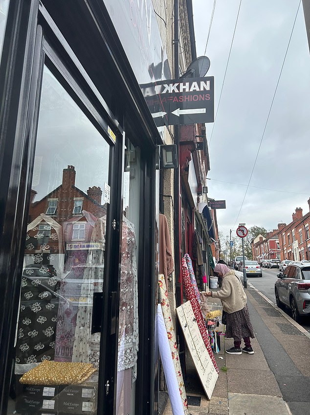 One man working at a fabric shop told of how all the communities get along and that the area boasts 'temples, churches, synagogues and mosques'