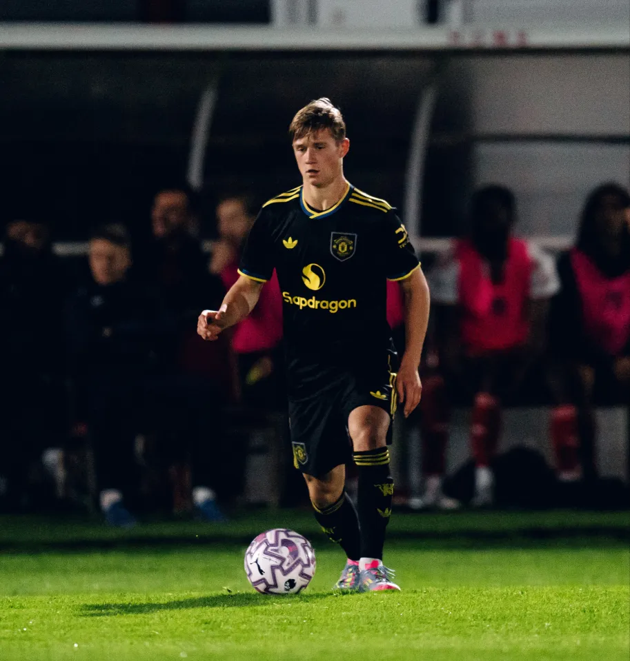 Jim Thwaites of Manchester United in action during a soccer match.