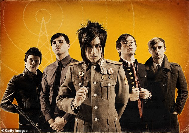 The guitarist (pictured, far right, with Watkins, centre, and the other members of Lostprophets) who co-founded Lostprophets with Watkins, replied to a fan wishing them well late last night with a post that read: 'Thanks for the kind words'