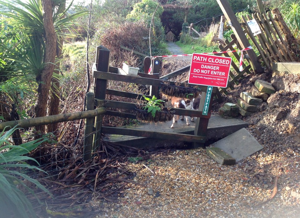 A footpath leading to Luccombe Cliffs, near Shanklin, Isle of Wight, with a sign reading "PATH CLOSED DANGER DO NOT ENTER."