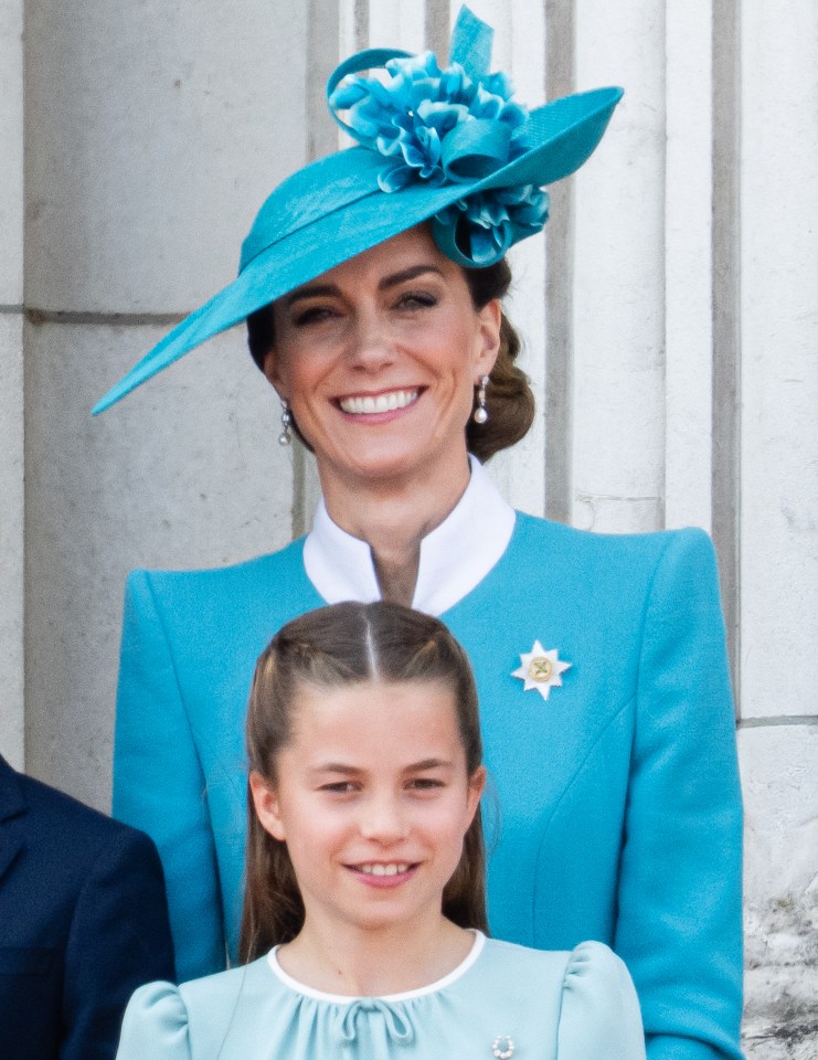 Catherine, Princess of Wales, and Princess Charlotte of Wales, smiling at the Trooping the Colour ceremony.