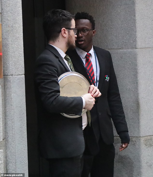 The co-owner of League Two Salford City, who has built a sprawling property empire in Manchester since retiring from football, told how he 'instantly' took down a Union Jack flag that was fluttering near one of his building sites (Pictured: Security outside the hotel)