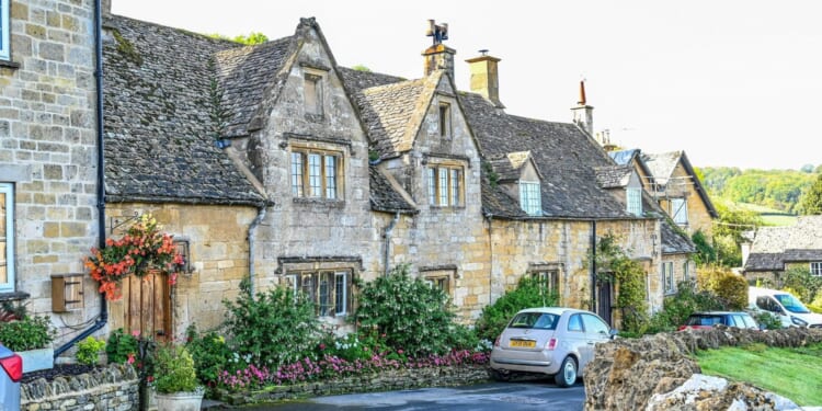 Historic village made famous by Bridget Jones locked in row over strict planning rules to stop it from looking 'flashy'