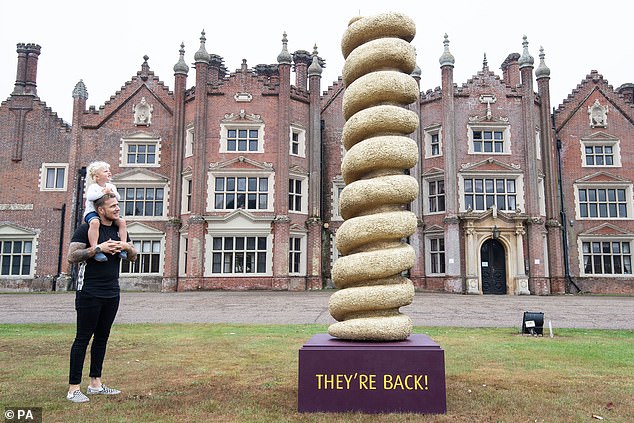 Rob Thornton and son Reign, age three in 2020, unveiled a 10ft (3m) statue of a Turkey Twizzler at its Great Witchingham Hall headquarters to reveal the release