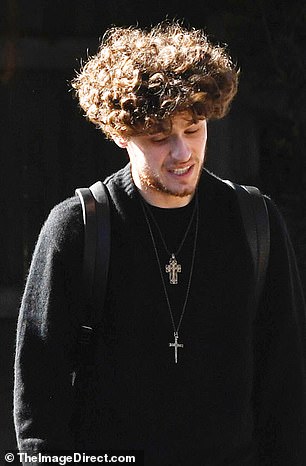 Duke, 25, found a unique way to pay tribute to his mother who adopted him as a baby the Oscar winner by wearing two cross necklaces in a look she made famous