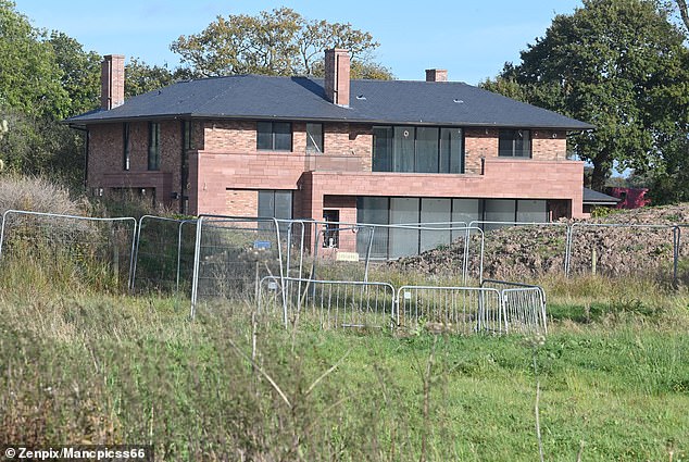 In photos of the build taken in October last year (seen), the exterior could be seen to be completed, but showed no landscaping and minimal interior work underway