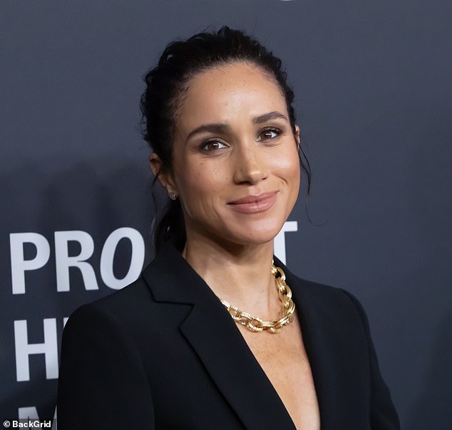 While reflecting on their friendship, the model and cookbook author gushed that she 'really adores' the Duchess of Sussex and cannot understand the level of scrutiny she endures; Markle seen in October