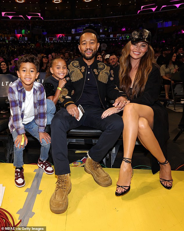 'I don't leave the house,' Teigen joked. 'I'm not joking. I don't go anywhere. I try to do every photo shoot, every everything at our house. So no. But if the time came up, absolutely'; Seen with husband John Legend and two of their four kids