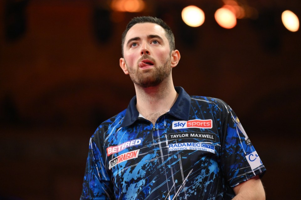 BLACKPOOL, ENGLAND - JULY 21: Luke Humphries of England looks on against Michael Van Gerwen of Netherlands during the Final of the Men's 2024 Betfred World Matchplay Finals at Winter Gardens on July 21, 2024 in Blackpool, England. (Photo by Ben Roberts Photo/Getty Images)