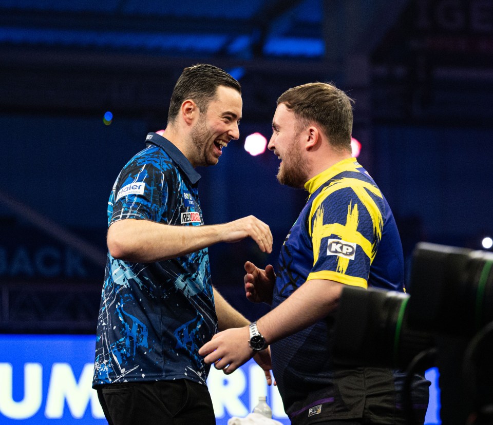 Luke Littler and Luke Humphries share a laugh before their Boyle Sports World Grand Prix final.