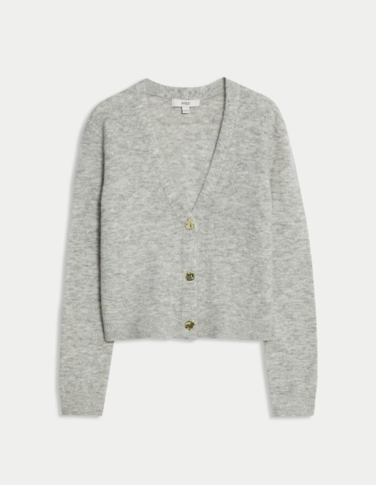 Gray M&S cardigan with golden buttons.