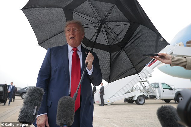 Trump speaks to the press before boarding Air Force One for a trip to the Middle East