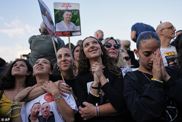 Tens of thousands of Israelis were also watching the transfers at public screenings across the country, with a major event being held in Tel Aviv