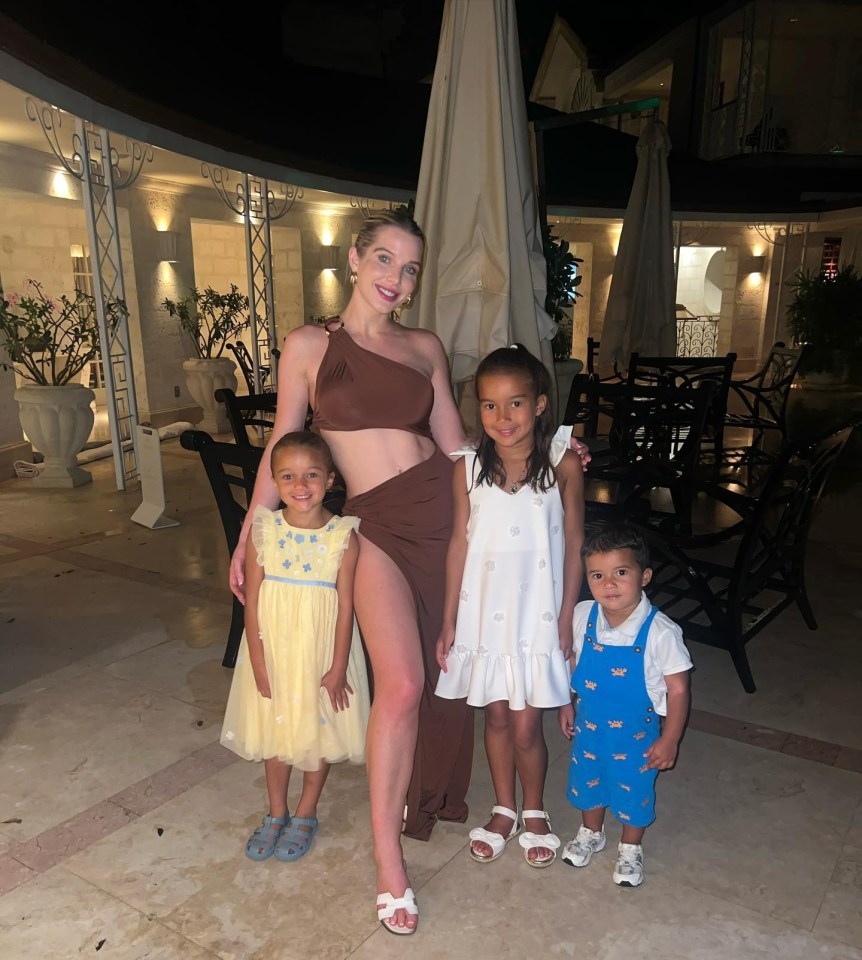 Helen Flanagan with her three children, two girls and a boy, on holiday in Barbados.
