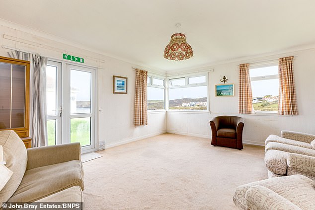 A view of the living room: The property has just 782 sq ft of living space in total with a reception room, kitchen, conservatory, two bedrooms and a bathroom
