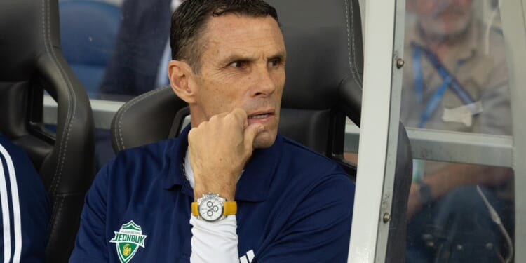 Ex-Chelsea and Tottenham star now managing in South Korea with footballer-turned-bodybuilder son his assistant