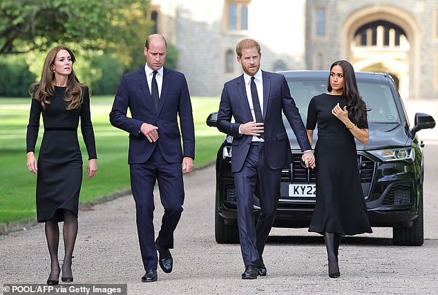 When Buckingham Palace announced in April 2023 that Harry would be attending King Charles's Coronation alone, a royal observer said that the family were 'relieved that Meghan won't be there'. Pictured: the Prince and Princess of Wales and Suxesses on the long Walk at Windsor Castle in September 2022