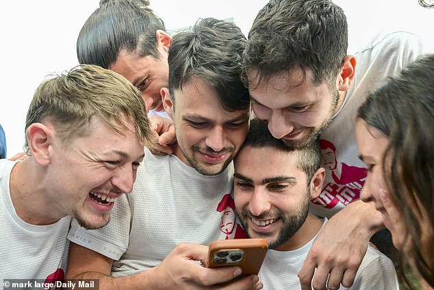 Friends piled in, desperate to catch the first glimpse of the 24-year-old alive since an image of him being forcibly starved and made to dig his own grave horrified the world in August