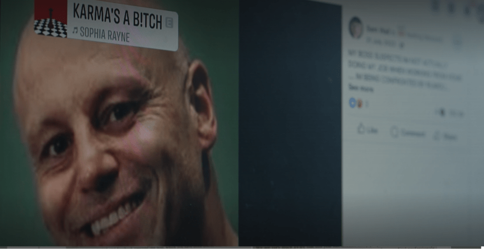 A close-up of a smiling bald man on a screen with a "Karma's A Bitch" song title and a social media post in the background.