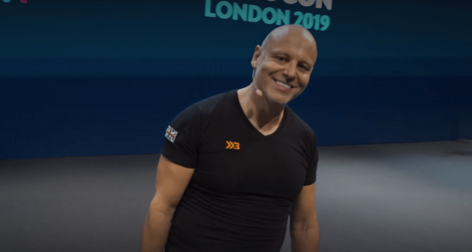 Joshua Saunders smiling and looking at the camera.