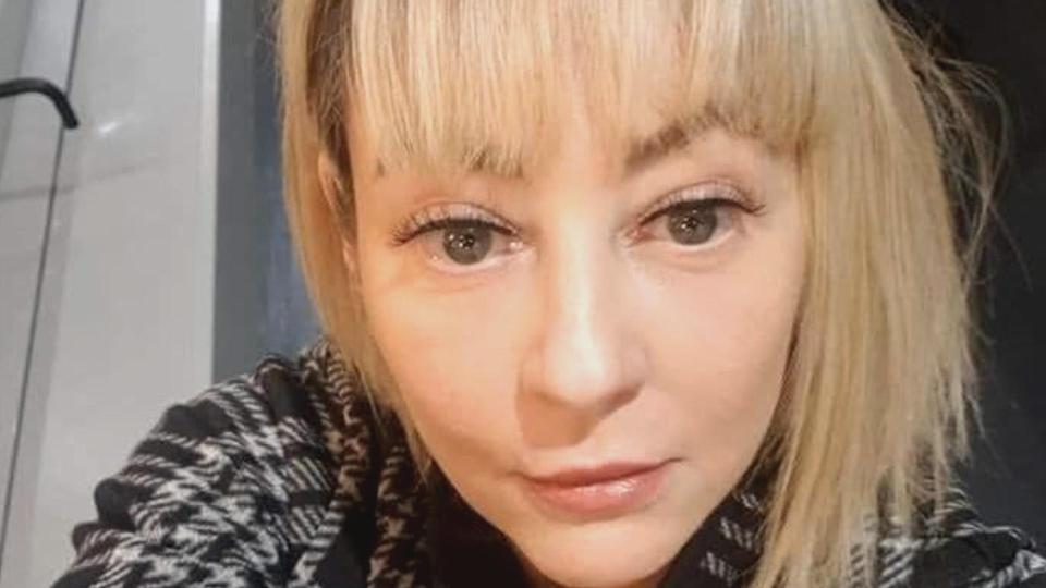 Close-up of a blonde woman.