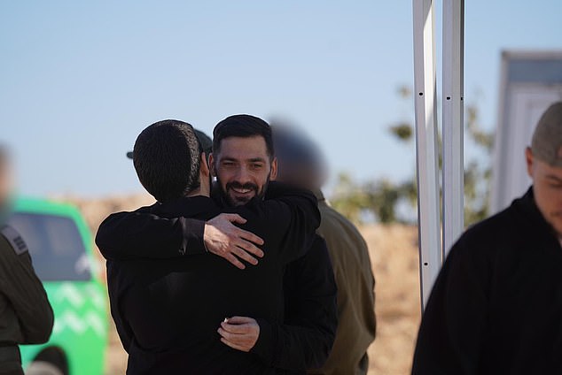 The first hug between brothers Gali and Ziv Berman following the release of hostages today
