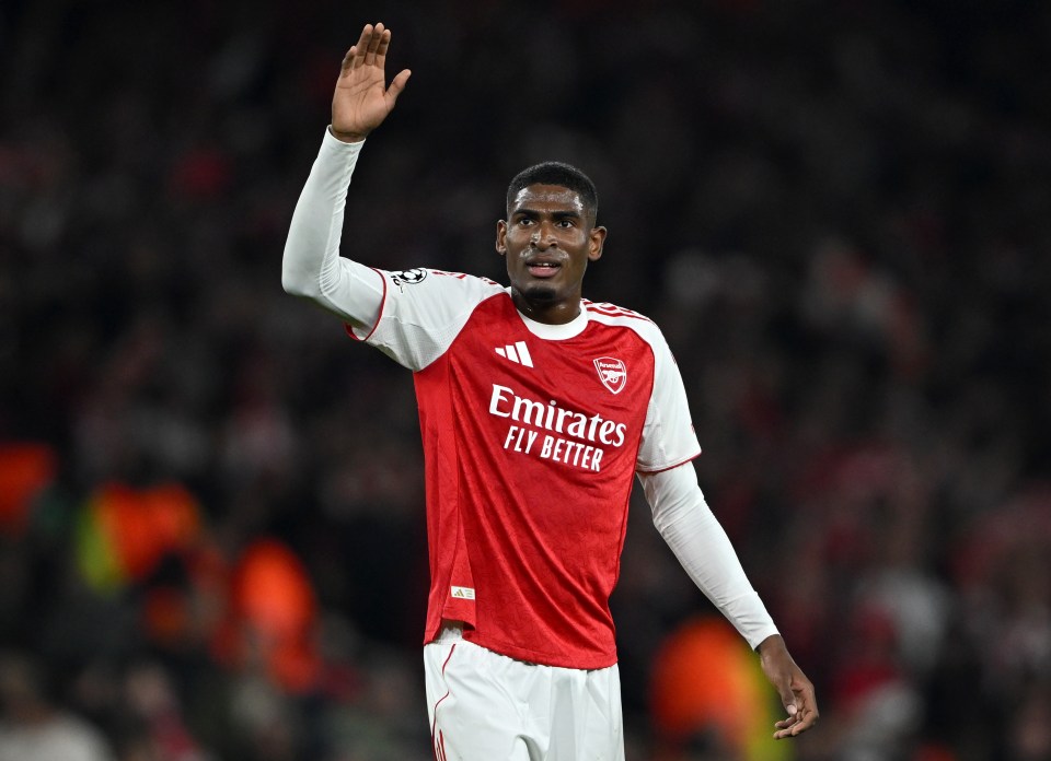 Cristhian Mosquera of Arsenal raises his hand to wave to the fans.