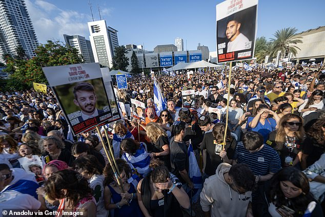 Israelis gather at Hostages Square to celebrate after the release of the first group of hostages held in Gaza on October 13, 2025 in Tel Aviv, Israel