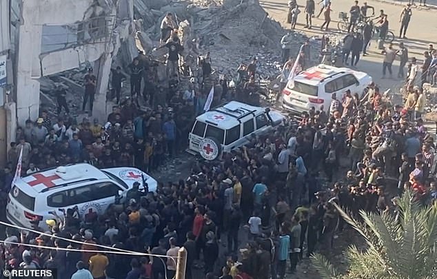 Red Cross vehicles transport hostages, held in Gaza since the deadly October 7, 2023 attack