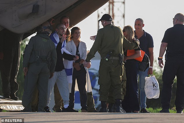 Rom Braslavski was seen draped in the Israeli flag as he greeted members of the IDF