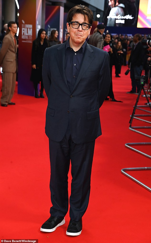 Comedian Michael McIntyre also made an appearance, keeping things simple in a dark blue shirt and suit and black trainers
