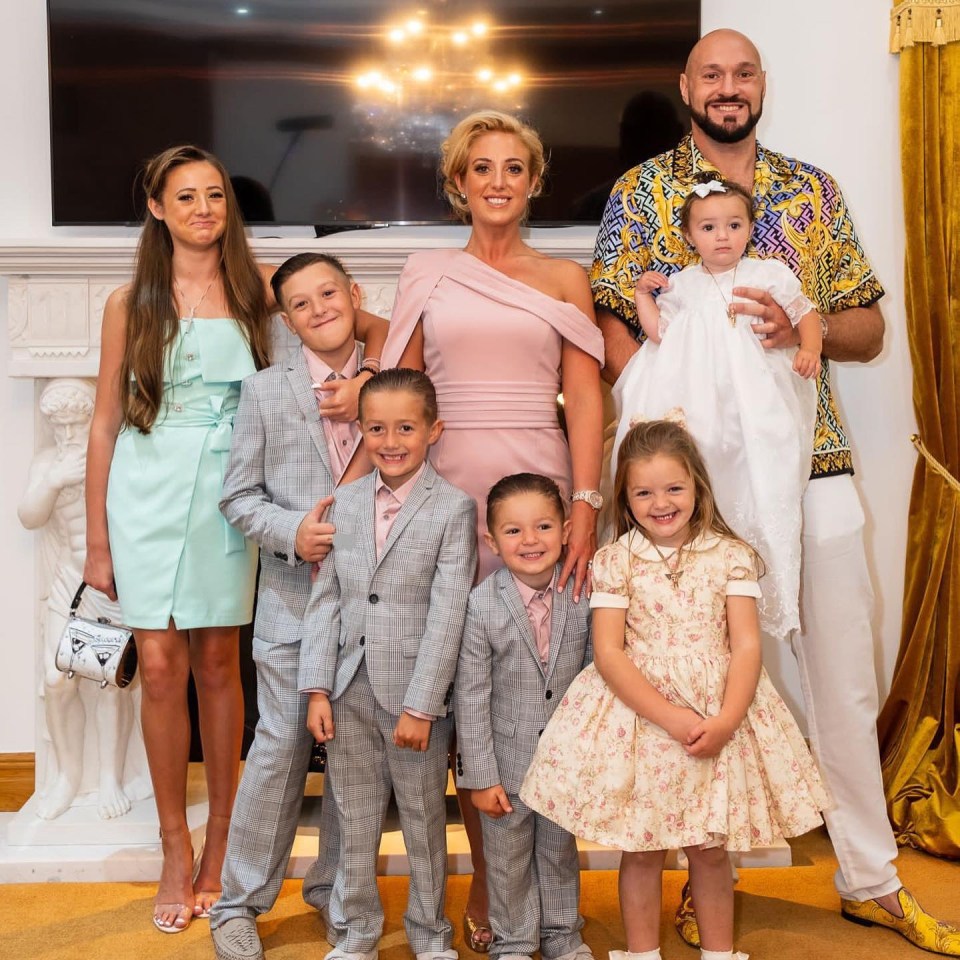 Tyson and Paris Fury with their six children at Athena's christening.