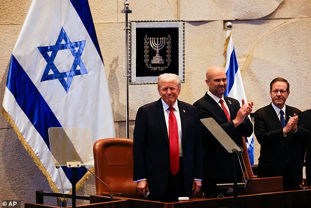 President Donald Trump reacts during his address to the Knesset, Israel's parliament, Monday