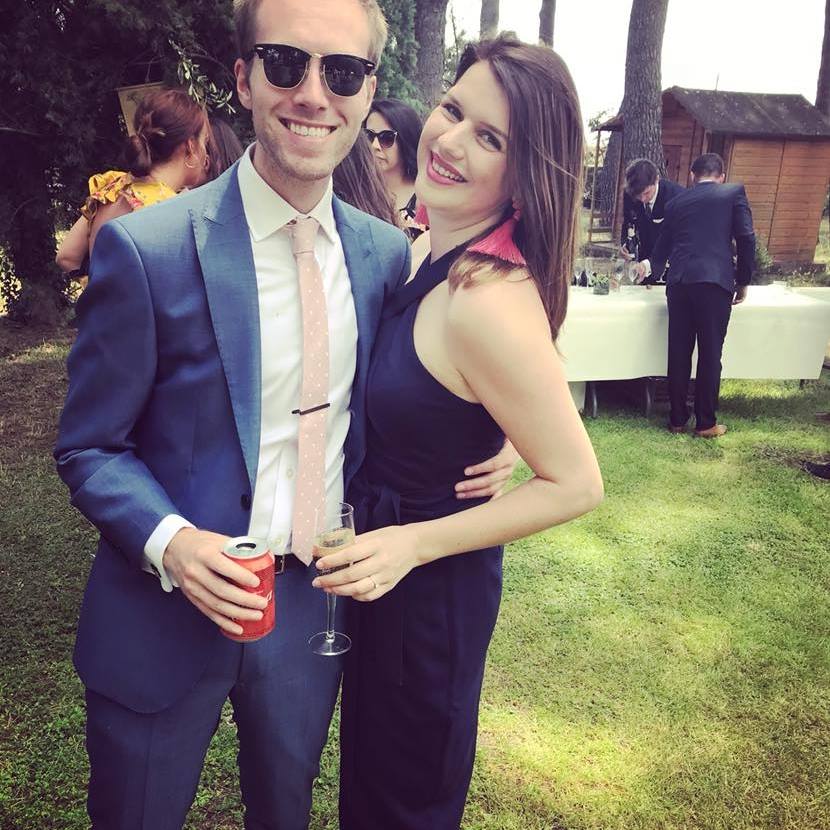 Rob and Jennifer Jen Cahill smiling at an outdoor event.