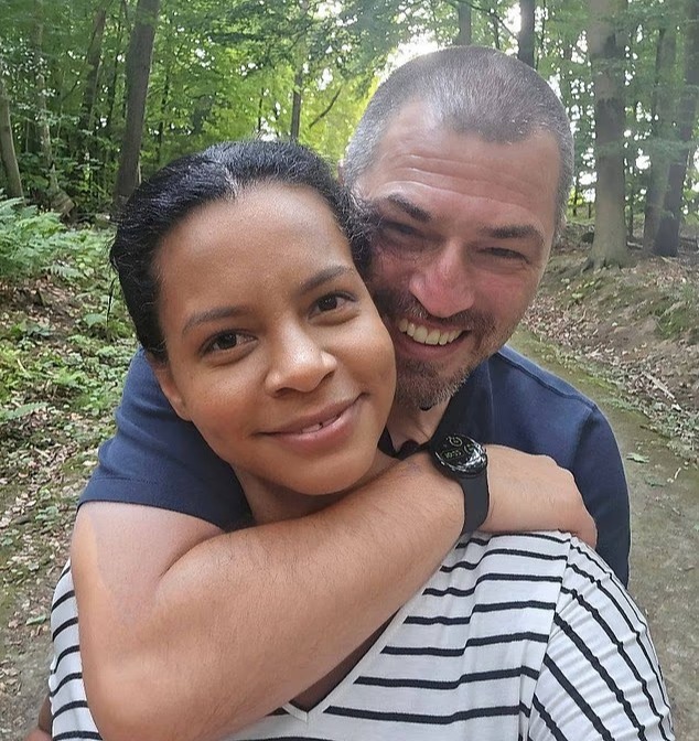 Shelly Punshon and Mark Bellingham embracing.