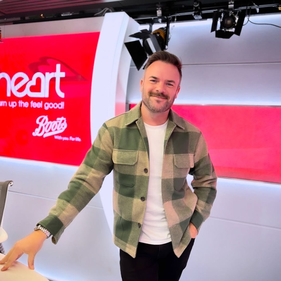 Radio star on air at Heart Radio studio.