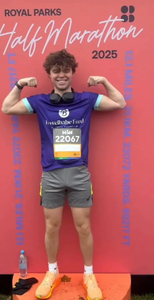 Hugo Bowen, son of Dame Deborah James, posing at the Royal Parks Half Marathon.
