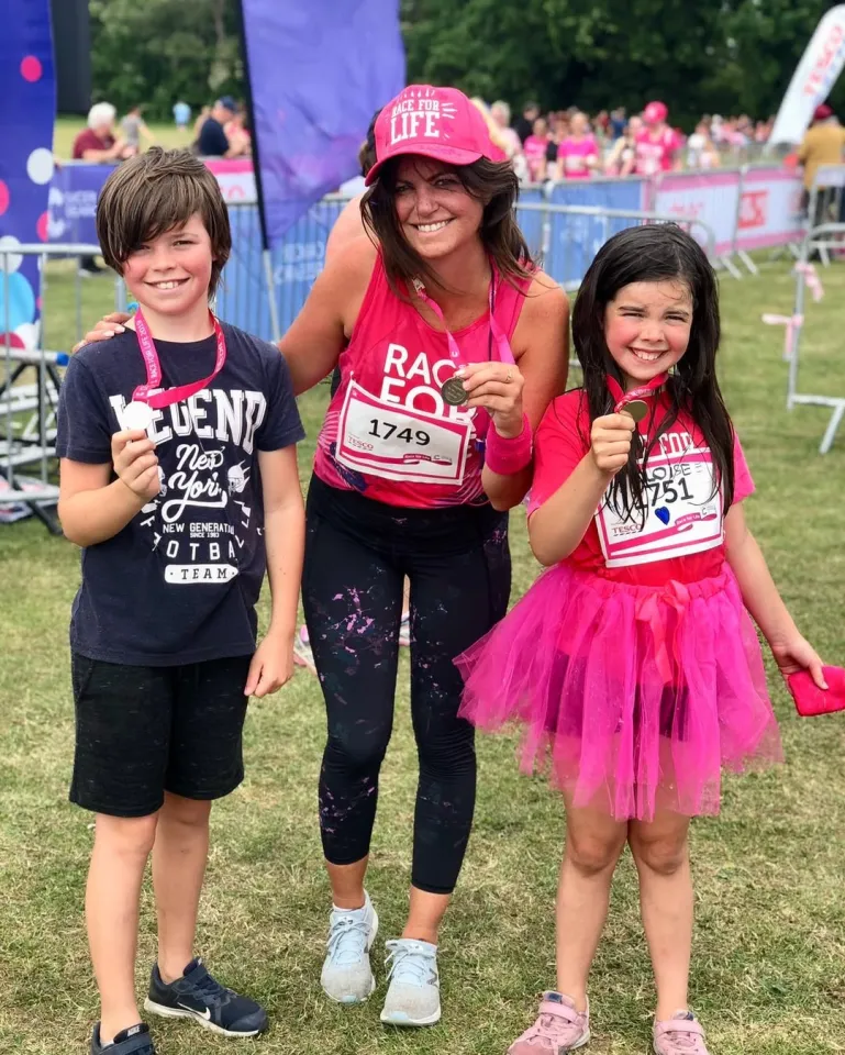 Deborah James with her children, Hugo and Eloise, after participating in the Race for Life.
