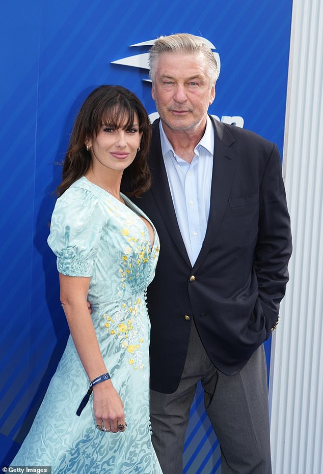 The 67-year-old 30 Rock actor — who attended the Chairman's Brunch at the 33rd Hamptons International Film Festival on Sunday evening with his 59-year-old brother — looked disheveled as he surveyed the wreck of his Range Rover after he ploughed into a tree - pictured with wife Hilaria in August