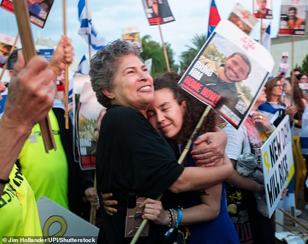 Supporters gathered in the streets to celebrate their hostages coming home