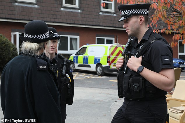 Crime scene investigators and various emergency service personnel were pictured at the scene