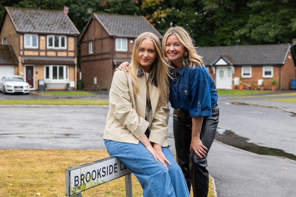Yasmin Davies and a woman in front of a Brookside Close sign.