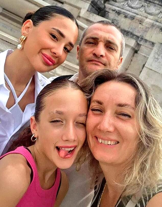 Sofia, back left, was killed during the Hamas attacks. Her father, Vladislav, killed himself as he struggled with the loss. His wife, Anna, said he was 'stuck in the massacre and felt heavy guilt'