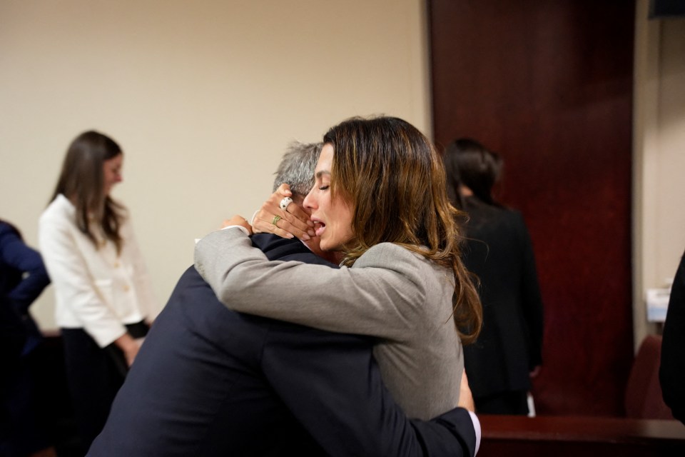 Alec Baldwin and Hilaria Baldwin embrace after the involuntary manslaughter trial.