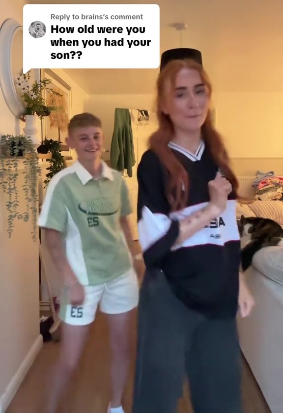 Two women dancing with a comment asking "How old were you when you had your son??"