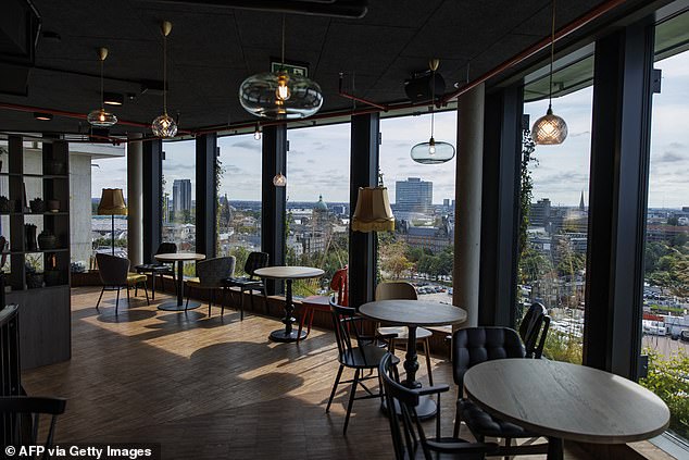 Pictured: The view through a window in the bunker building transformed into a park and leisure complex