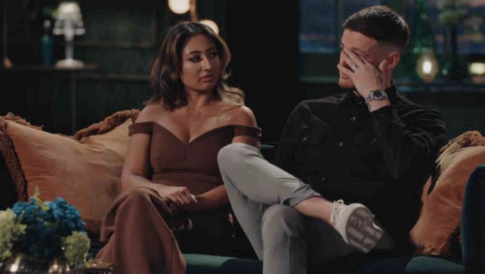 Nelly looking at Steven with a critical expression while Steven covers his face.