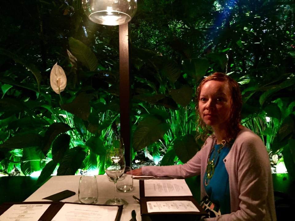 Sandra Parker sitting at a restaurant table.