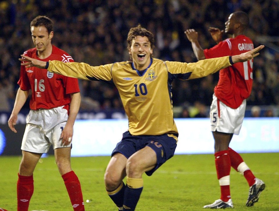 Zlatan Ibrahimovic of Sweden celebrates his 1-0 goal in front of Gareth Southgate and Anthony Gardner of England.