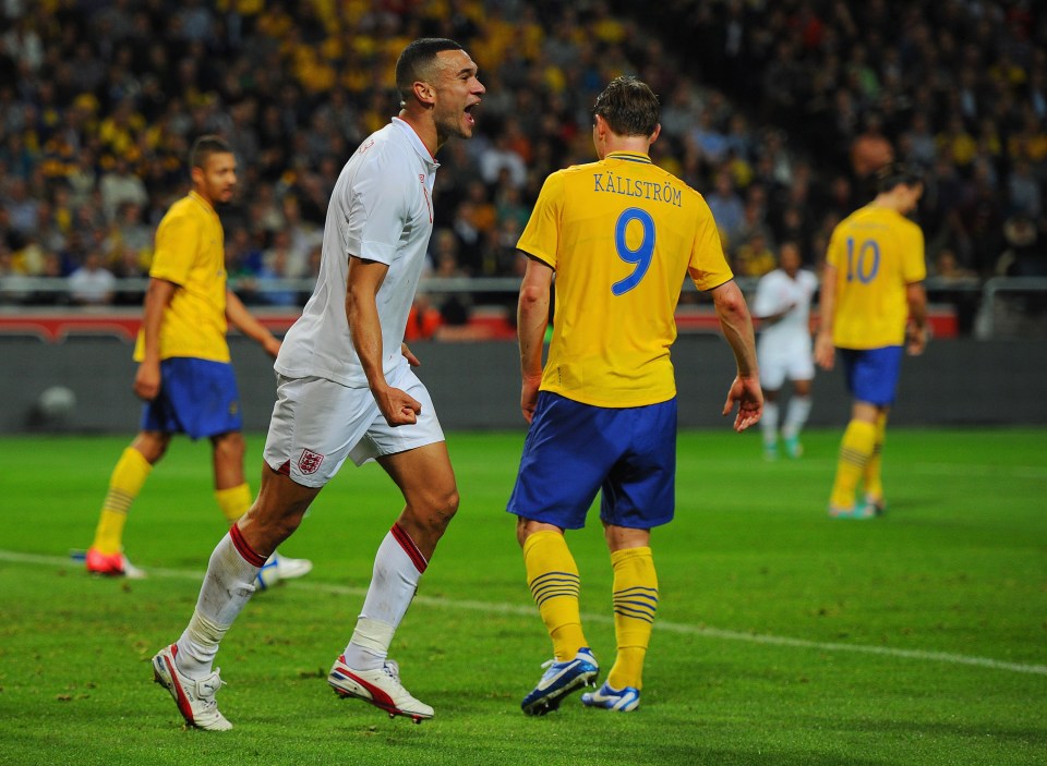Steven Caulker of England celebrates scoring during a friendly match against Sweden.